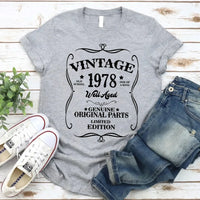 May include a personalized vintage-style birthday T-shirt with the words Well Aged and a custom year printed on the front.