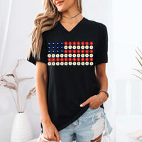Woman wearing black V-neck tee with American flag floral print, casual summer outfit.