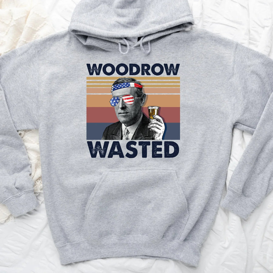 Gray hoodie with graphic of a man holding a drink and text 'Woodrow Wasted' on a white background