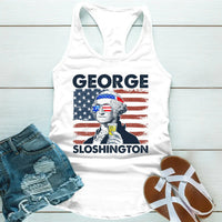 White tank top with 'GEORGE SLOSHINGTON' graphic, denim shorts, and sandals on a light wooden surface.