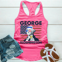 Pink tank top with 'George Sloshington' graphic on a wooden surface with shorts and sandals.