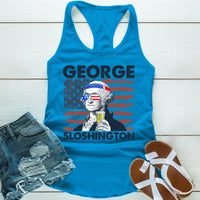 Blue tank top with graphic design of a historical figure and text, paired with denim shorts and sandals on a wooden surface.