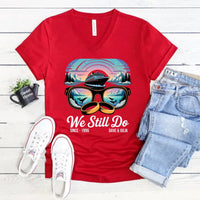 Red custom graphic tee with cruise ship, sunglasses, rings, and 'We Still Do' anniversary text