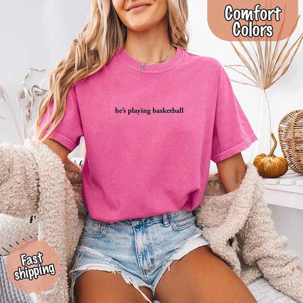 He’s Playing Basketball – Funny Sports Girlfriend Comfort Color Shirt for Women
