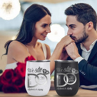 Couple with personalized tumblers celebrating 26 years together, surrounded by flowers.