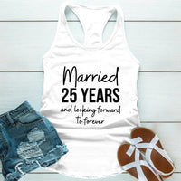 White tank top with 'Married 25 Years and looking forward to forever' text, paired with denim shorts and sandals on a light wooden surface.
