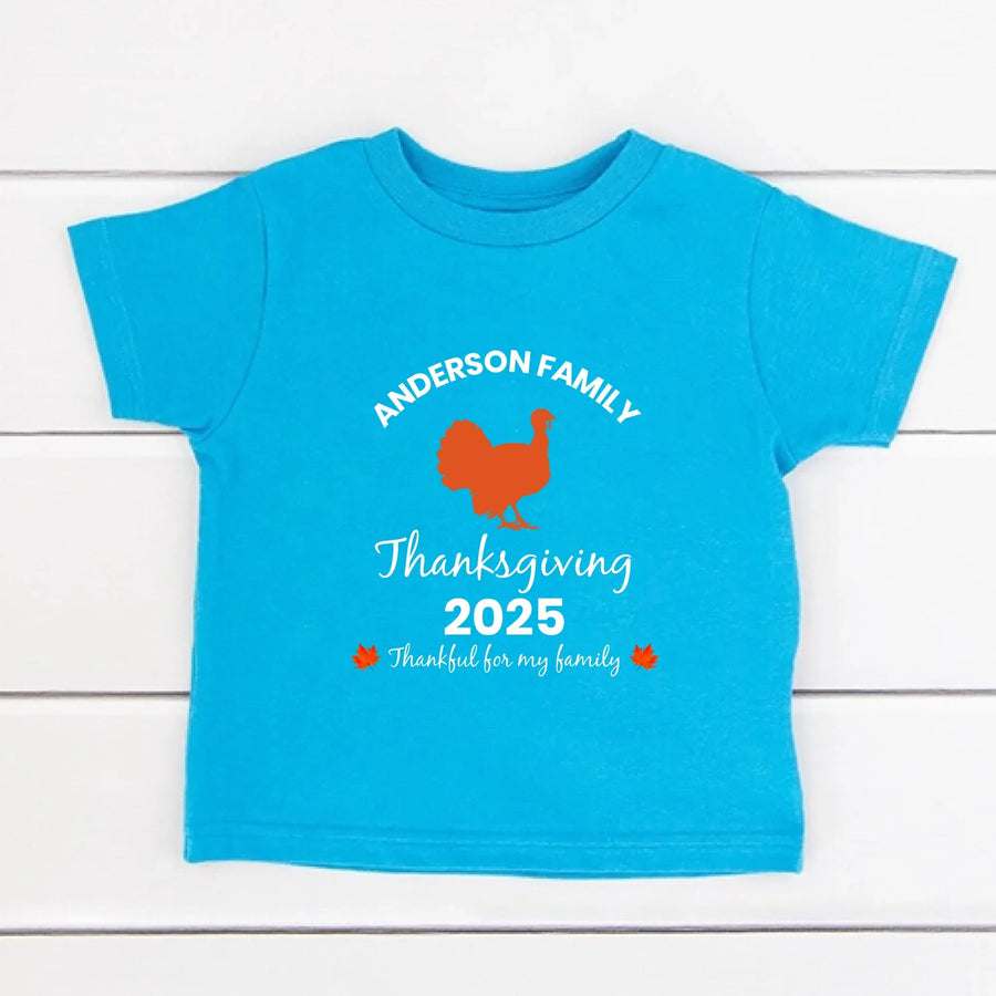 May include matching family t-shirts with a Thankful Fall theme, personalized with individual names, designed for Thanksgiving gatherings.