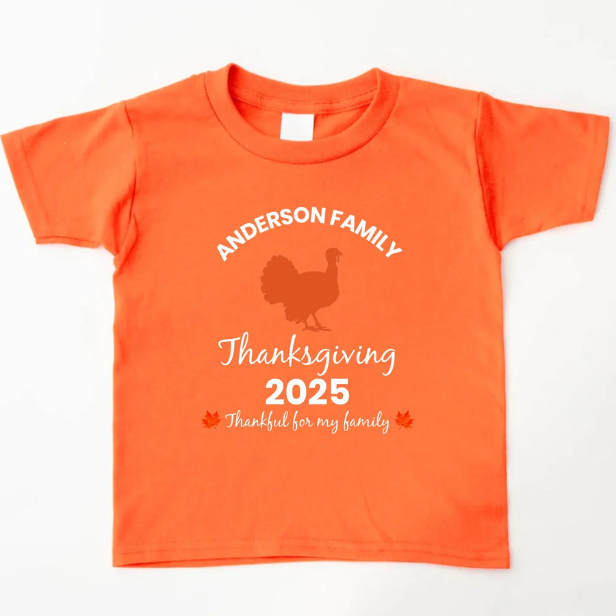 May include matching family t-shirts with a Thankful Fall theme, personalized with individual names, designed for Thanksgiving gatherings.
