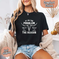 May include a Comfort Colors unisex Western shirt with “If I’m The Problem Then You Might Be The Reason” text, styled with vintage country flair.