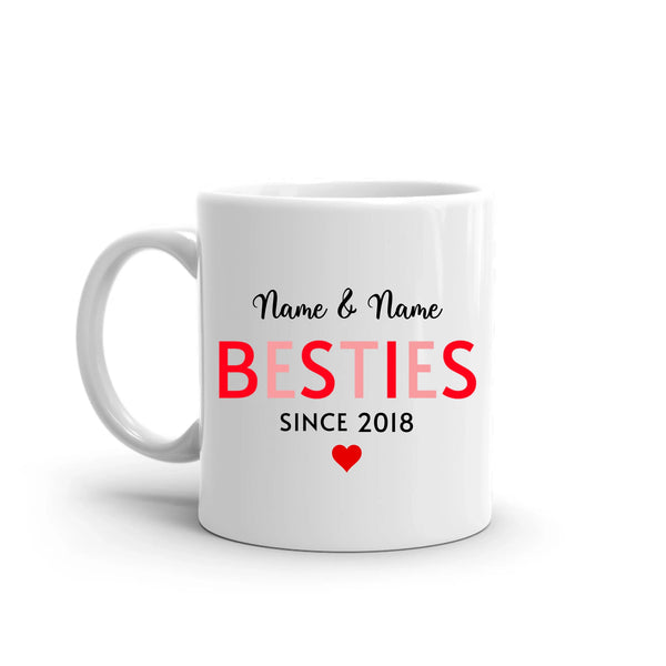 White mug with 'BESTIES' text and customizable names on a white background