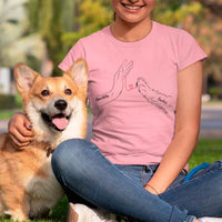 May include a personalized shirt with a dog paw and human hand joined by a red thread heart, with space for a custom pet name.