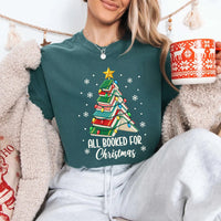 May include an All Booked for Christmas Book Lover Comfort Colors T-Shirt featuring a festive Christmas and reading-inspired design.