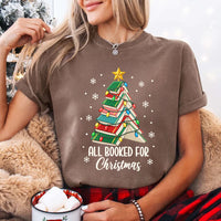 May include an All Booked for Christmas Book Lover Comfort Colors T-Shirt featuring a festive Christmas and reading-inspired design.
