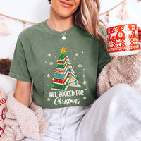 May include an All Booked for Christmas Book Lover Comfort Colors T-Shirt featuring a festive Christmas and reading-inspired design.