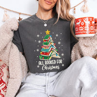 May include an All Booked for Christmas Book Lover Comfort Colors T-Shirt featuring a festive Christmas and reading-inspired design.