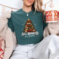 May include an All Booked for Christmas Comfort Colors T-Shirt featuring a festive book lover statement design.
