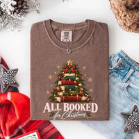 May include an All Booked for Christmas Comfort Colors T-Shirt featuring a festive book lover statement design.