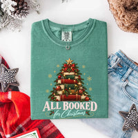 May include an All Booked for Christmas Comfort Colors T-Shirt featuring a festive book lover statement design.