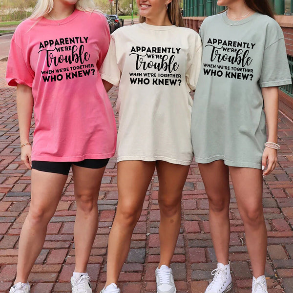May include matching bachelorette party t-shirts with Apparently We’re Trouble When We’re Together text.