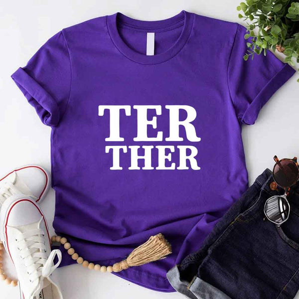 May include a “Better Together” couples T-shirt design with bold, friendly lettering arranged in a balanced layout, often paired with a small heart or link-style graphic that reflects unity and closeness.