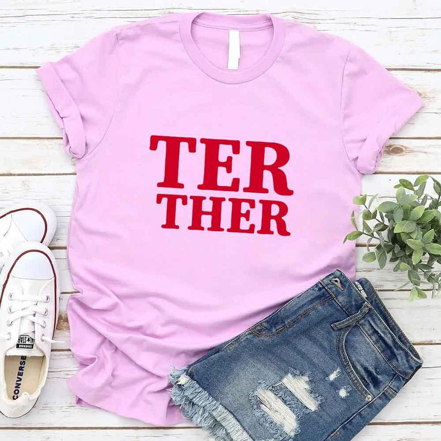 May include a “Better Together” couples T-shirt design with bold, friendly lettering arranged in a balanced layout, often paired with a small heart or link-style graphic that reflects unity and closeness.