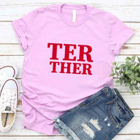May include a “Better Together” couples T-shirt design with bold, friendly lettering arranged in a balanced layout, often paired with a small heart or link-style graphic that reflects unity and closeness.