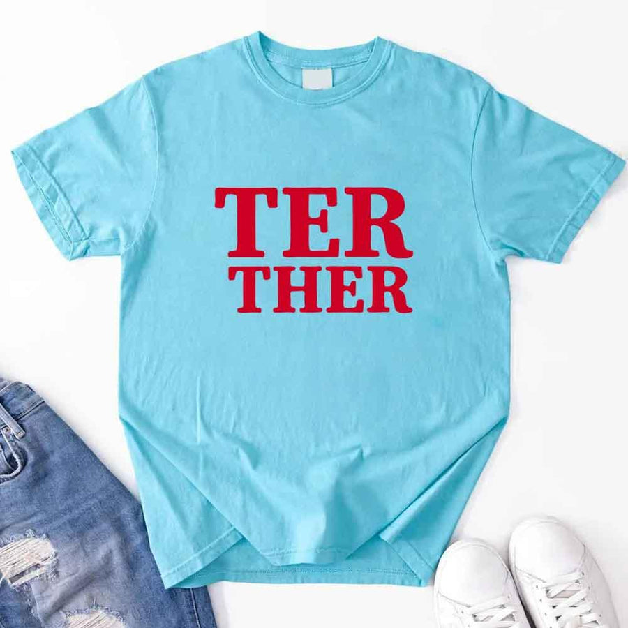 May include a “Better Together” couples T-shirt design with bold, friendly lettering arranged in a balanced layout, often paired with a small heart or link-style graphic that reflects unity and closeness.