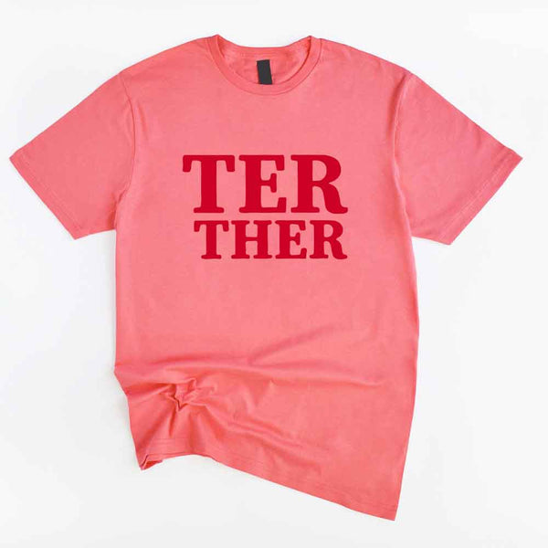 May include a “Better Together” couples T-shirt design with bold, friendly lettering arranged in a balanced layout, often paired with a small heart or link-style graphic that reflects unity and closeness.