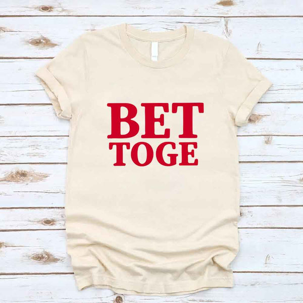 May include a “Better Together” couples T-shirt design with bold, friendly lettering arranged in a balanced layout, often paired with a small heart or link-style graphic that reflects unity and closeness.