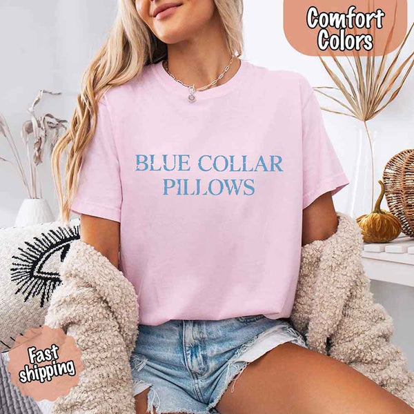 May include light blue distressed text that reads “Blue Collar Pillows,” using a simple serif font to evoke hardworking pride with a touch of rugged charm.