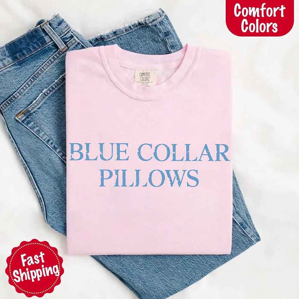 May include light blue distressed text that reads “Blue Collar Pillows,” using a simple serif font to evoke hardworking pride with a touch of rugged charm.