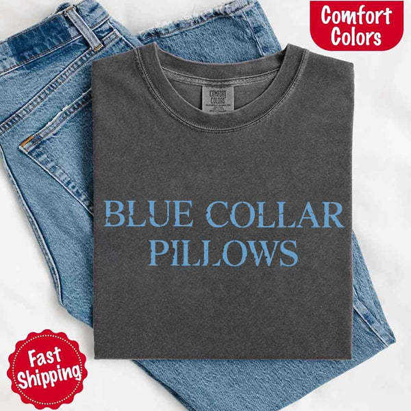 May include light blue distressed text that reads “Blue Collar Pillows,” using a simple serif font to evoke hardworking pride with a touch of rugged charm.