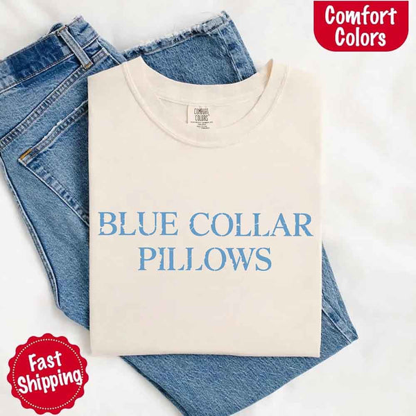 May include light blue distressed text that reads “Blue Collar Pillows,” using a simple serif font to evoke hardworking pride with a touch of rugged charm.