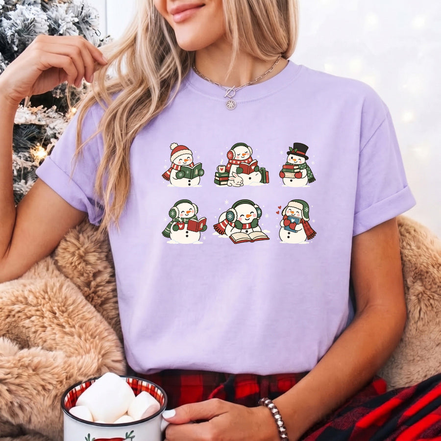 May include a Book Lover Snowman Christmas Comfort Colors T-Shirt featuring a festive snowman and book-inspired holiday design.
