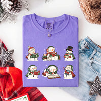 May include a Book Lover Snowman Christmas Comfort Colors T-Shirt featuring a festive snowman and book-inspired holiday design.