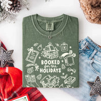 May include a Booked for the Holidays Comfort Colors T-Shirt featuring a festive Christmas and book-inspired statement design.