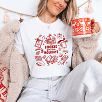 May include a Booked for the Holidays Comfort Colors T-Shirt featuring a festive Christmas and book-inspired statement design.
