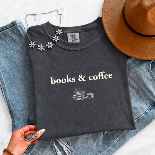 May include Books & Coffee Comfort Colors t-shirt with reading-inspired graphic, relaxed unisex fit, and garment-dyed cotton
