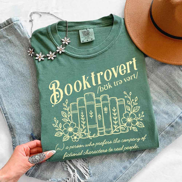 May include Booktrovert Comfort Colors t-shirt with book lover graphic, relaxed unisex fit, and garment-dyed cotton