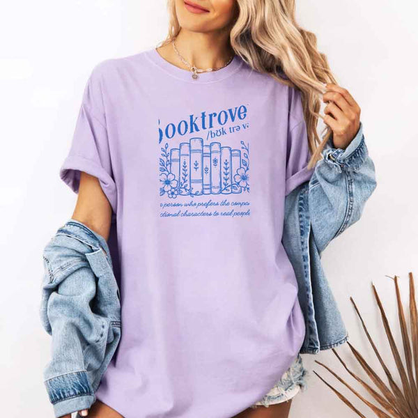 May include Booktrovert Comfort Colors t-shirt with book lover graphic, relaxed unisex fit, and garment-dyed cotton
