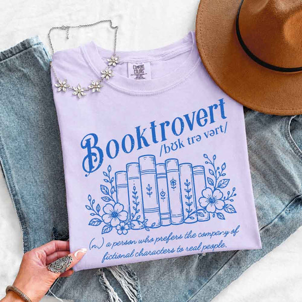 May include Booktrovert Comfort Colors t-shirt with book lover graphic, relaxed unisex fit, and garment-dyed cotton