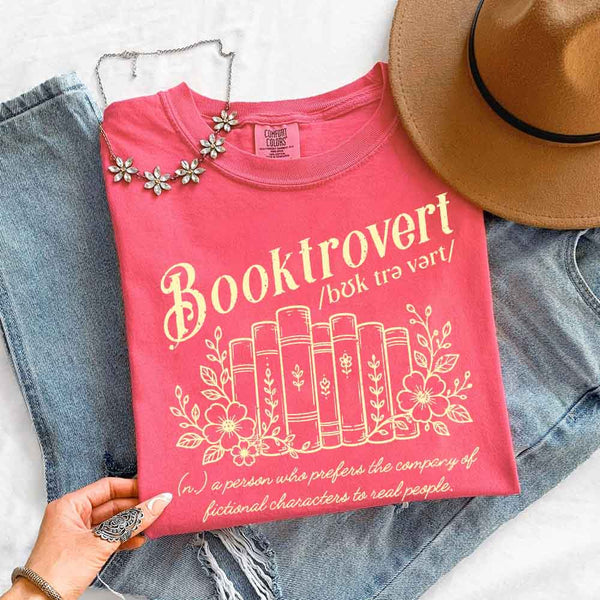 May include Booktrovert Comfort Colors t-shirt with book lover graphic, relaxed unisex fit, and garment-dyed cotton