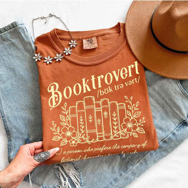 May include Booktrovert Comfort Colors t-shirt with book lover graphic, relaxed unisex fit, and garment-dyed cotton