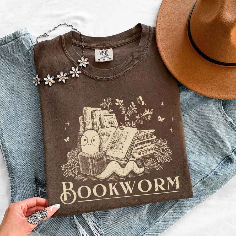 May include Bookworm Comfort Colors t-shirt with book lover graphic, relaxed unisex fit, and garment-dyed cotton