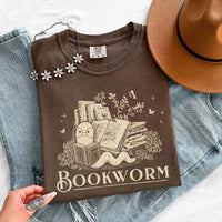 May include Bookworm Comfort Colors t-shirt with book lover graphic, relaxed unisex fit, and garment-dyed cotton