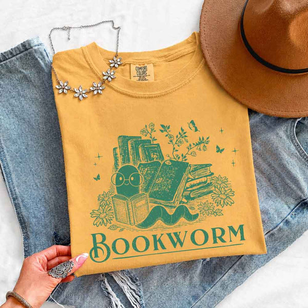 May include Bookworm Comfort Colors t-shirt with book lover graphic, relaxed unisex fit, and garment-dyed cotton