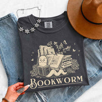 May include Bookworm Comfort Colors t-shirt with book lover graphic, relaxed unisex fit, and garment-dyed cotton