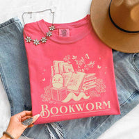 May include Bookworm Comfort Colors t-shirt with book lover graphic, relaxed unisex fit, and garment-dyed cotton