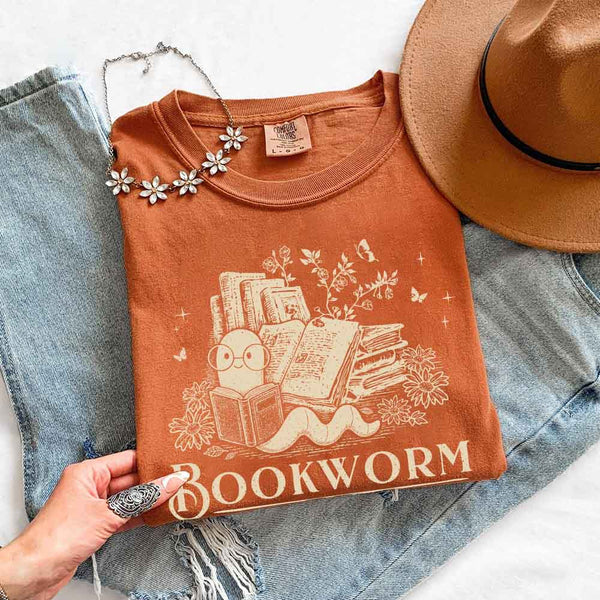 May include Bookworm Comfort Colors t-shirt with book lover graphic, relaxed unisex fit, and garment-dyed cotton