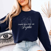 May include a person wearing a Navy Change Your Story Like Sophie Crewneck Sweatshirt featuring royal inspired graphic and classic fit.